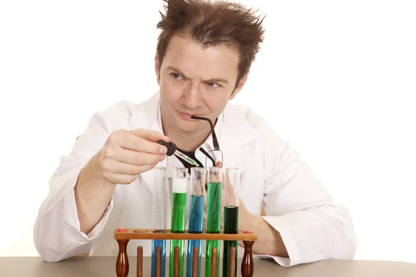 Mad scientist bite glasses dropper — Stock Photo, Image