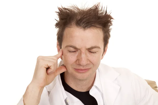 Doctor messed up hair eyes closed — Stock Photo, Image