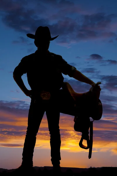 Silhuett av cowboy, sadel — Stockfoto