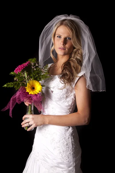 Woman wedding dress on black flowers serious — Stock Photo, Image