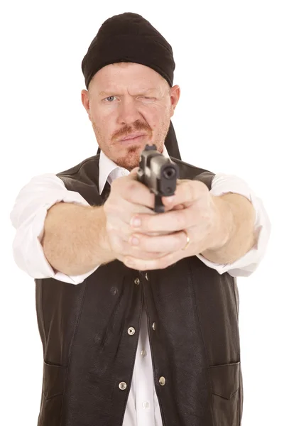 Man black bandana vest and gun aiming — Stock Photo, Image