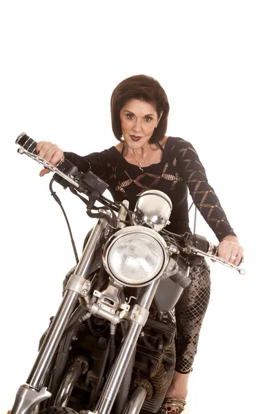 Older woman on motorcycle serious — Stock Photo, Image