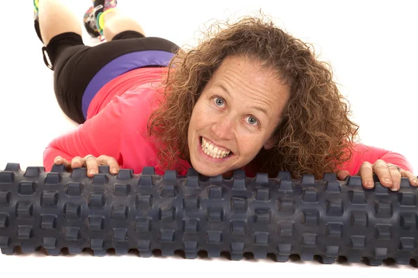 Woman pink sports shirt roll — Stock Photo, Image