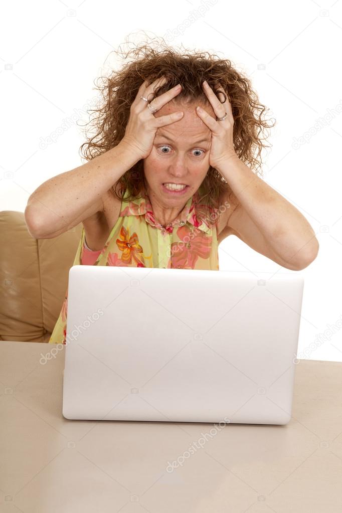 Woman laptop hand hair frustrated