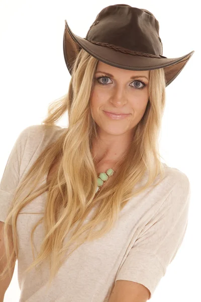 Cowgirl light shirt close look slight smile — Stock Photo, Image