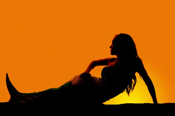 Silhouette mermaid lay on side — Stock Photo, Image