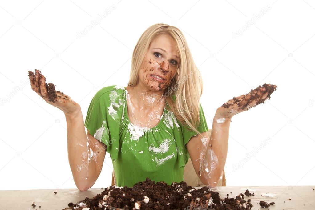 woman green shirt with cake on her 