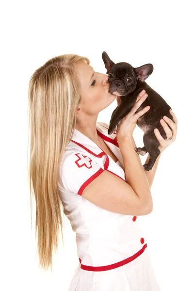 Nurse with small dog hold kiss — Stock Photo, Image