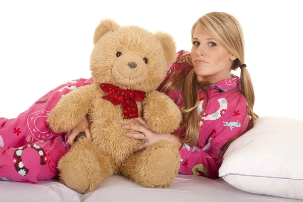 Woman pink pajamas bear lay on side look — Stock Photo, Image