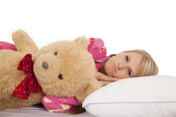 Woman pink pajamas bear lay — Stock Photo, Image