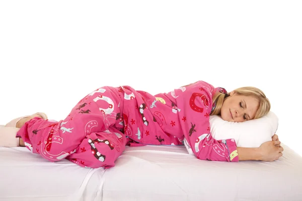 Woman pink pajamas lay side asleep — Stock Photo, Image
