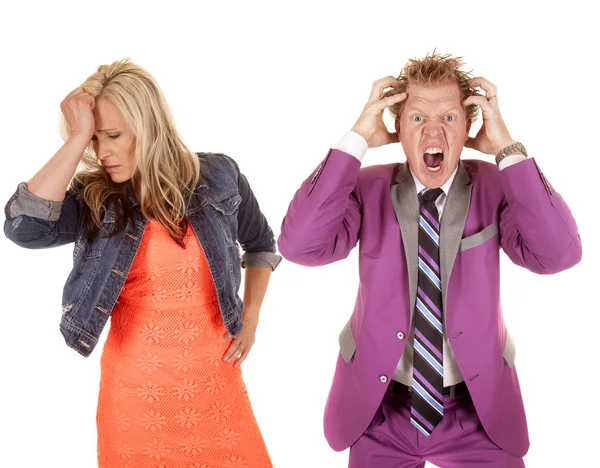 Man and woman colorful frustrated — Stock Photo, Image