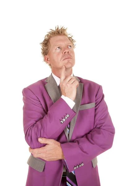 Man in purple suit thinking — Stock Photo, Image