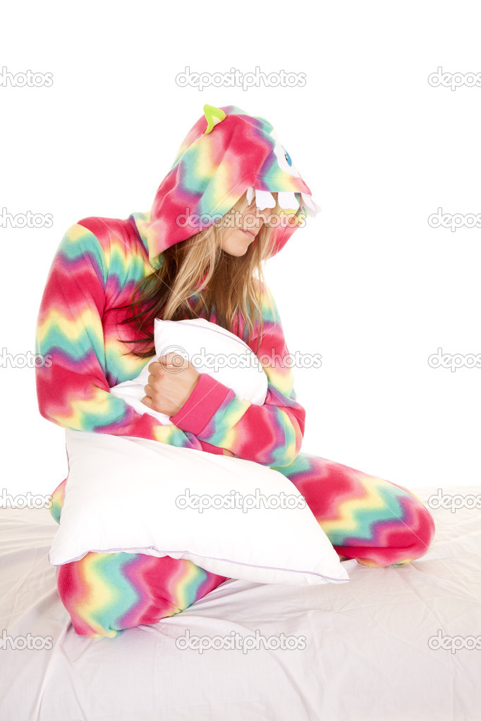 Woman sit with pillow look down