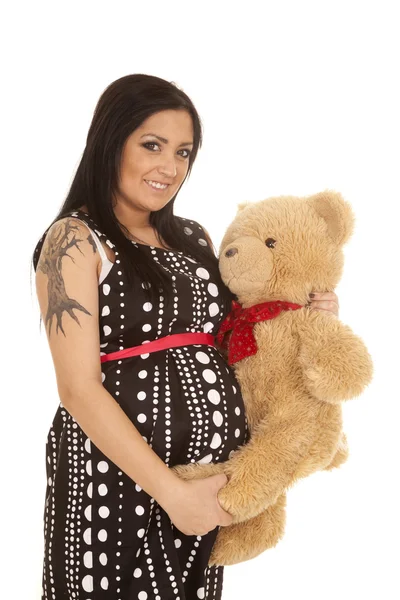 Pregnant woman holding her teddy bear — Stock Photo, Image