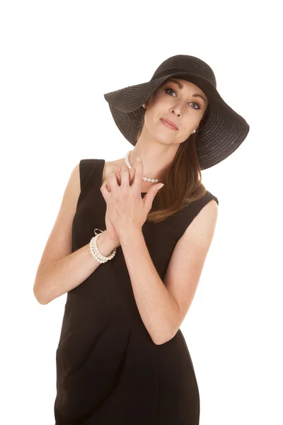 Woman with her hands up by her neck — Stock Photo, Image