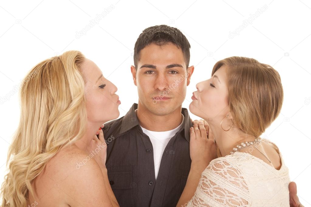 two women ready to kiss man close