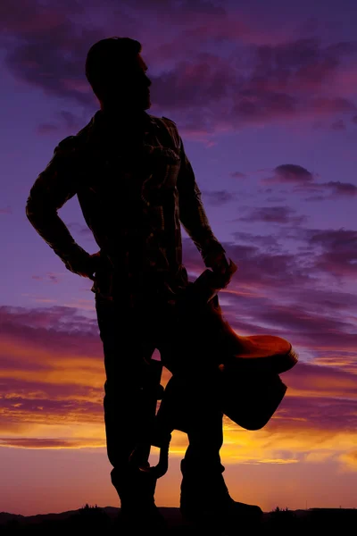 Silueta hombre vaquero silla de montar mirar lado —  Fotos de Stock