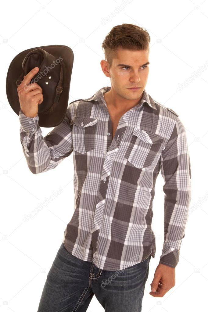 man plaid shirt western hat inhand look side