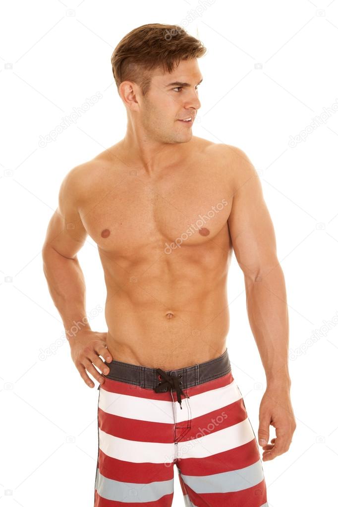 man red white stripe shorts look to side