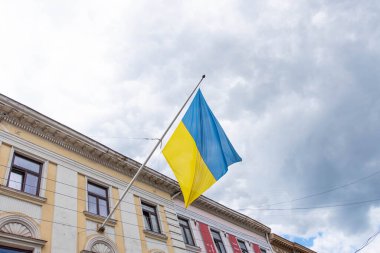 Ukrainian flag on an ancient building