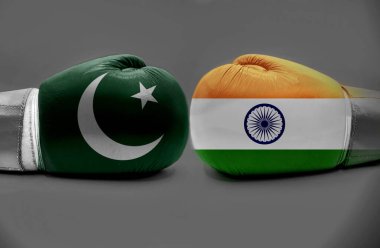INDIA, gri arka planda boks eldivenleri konusunda PAKISTAN 'a karşı.