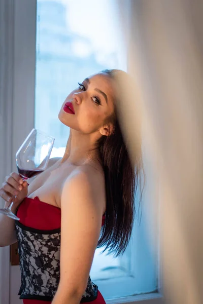 Female Goddess Red Dress Corset Holds Glass Wine Her Hand — Stock Photo, Image