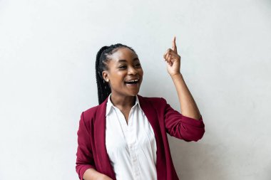 Portrait of young successful expert freelancer CEO African American woman with happy face. Business female satisfied with project showing her new ideas success  facial expressions 