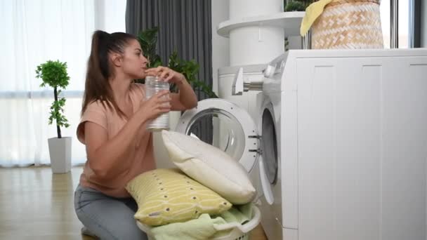 Young Woman Housewife Putting Clothes Laundry Washing Machine Wash Stuff — Vídeo de stock