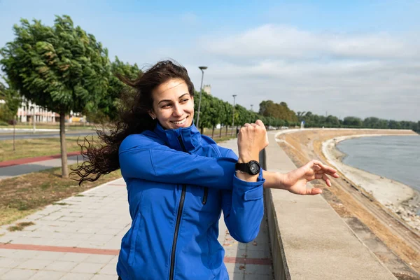 Young woman cancer survivor decides to change her way of life after illness and start practicing every morning as new life routine. Female workout training outdoor for health and happiness.