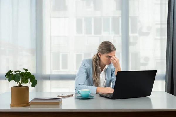 Frustrated annoyed woman confused by computer problem, annoyed businesswoman feels indignant about laptop crash, bad news online or disgusting video on web, stressed student looking at broken pc