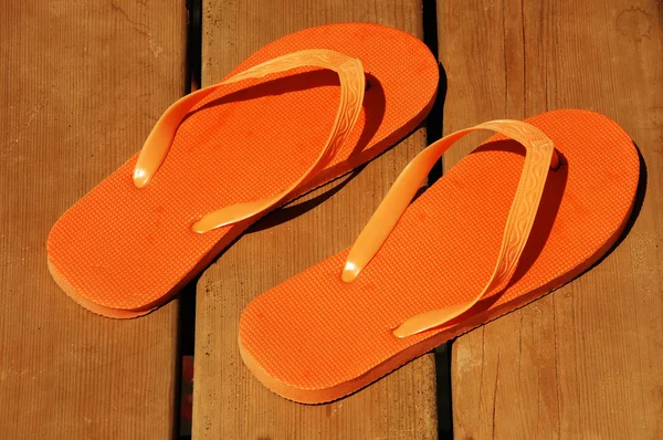 Oranje sandalen — Stockfoto