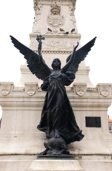 Statue of angel with cross(Portugal) — Stock Photo, Image