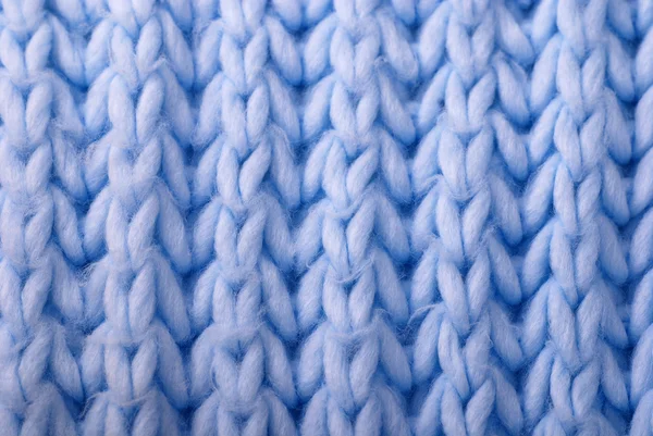 Blauer Wolle gestrickter Hintergrund Stockbild