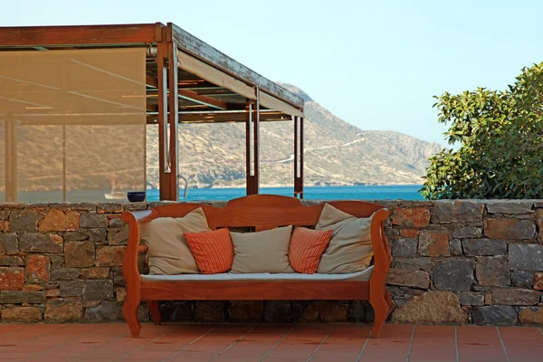 Mediterranean sea view with outdoor sofa (Greece) — Stock Photo, Image