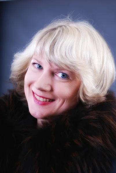 Smiling woman in fur — Stock Photo, Image