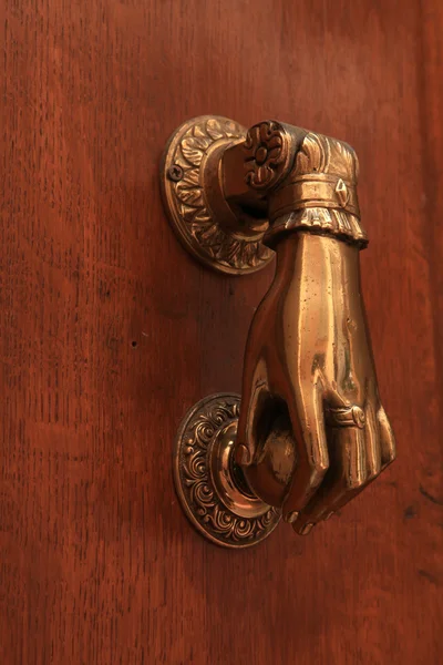 Antique brass knocker — Stock Photo, Image