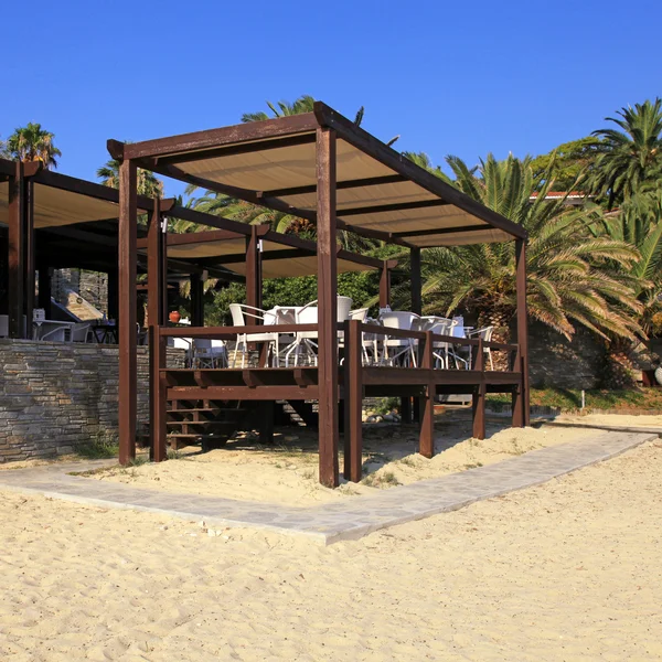 Outdoor terrace cafe on sand beach — Stock Photo, Image