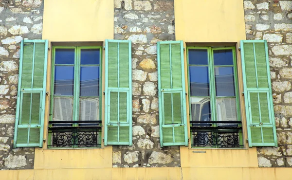 French rustic windows with old green shutters, Provence, France. — Stock Photo, Image