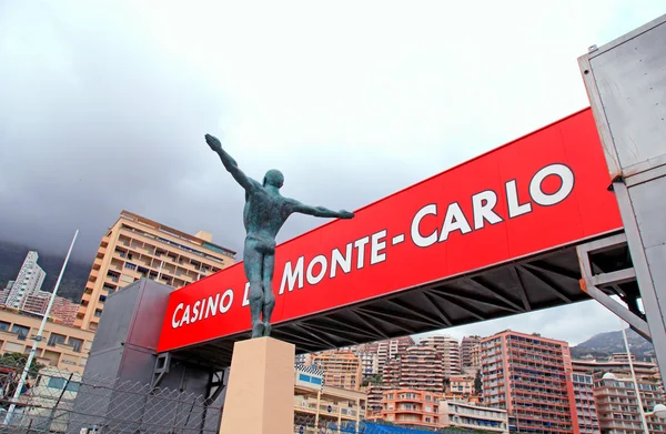 Brons staty och skylt, monaco, monte-carlo. — Stockfoto