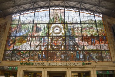 Bilbao, Spain - 22 April 2022: Stain Glass window in the Abando Train Station, Bilbao, Spain clipart