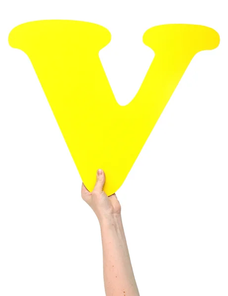 Alphabet letter V in the hand — Stock Photo, Image