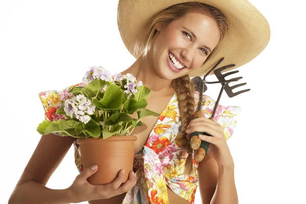 Giovane donna giardiniere — Foto Stock