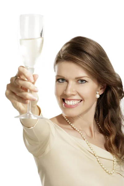 Mladá žena se sklenkou šampaňského — Stock fotografie