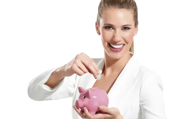 Jonge mooie vrouw permanent met piggy bank spaarpot — Stockfoto