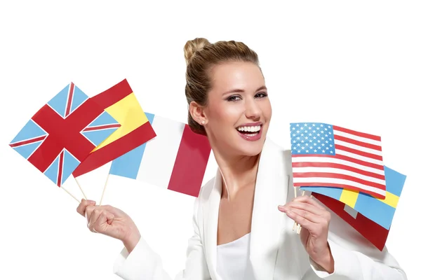 Hermosa mujer mostrando banderas internacionales — Foto de Stock