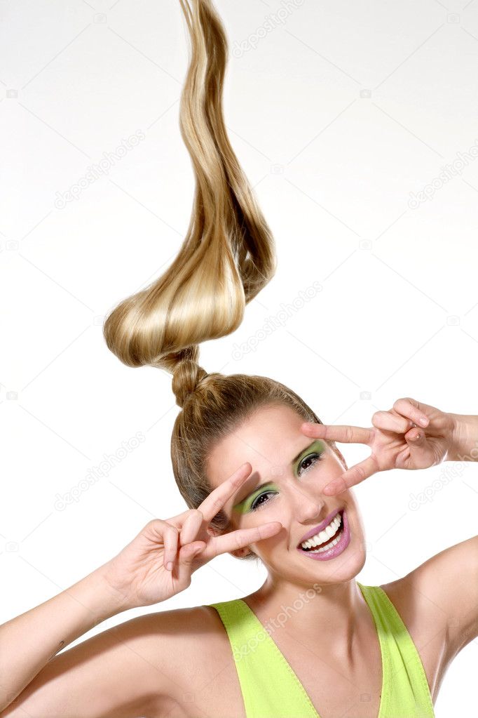 a beautiful girl showing long windy hair