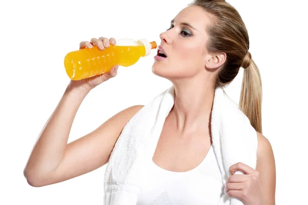Running woman refreshing with a drink — Stock Photo, Image