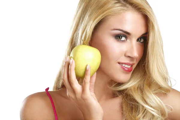 Young happy beautiful girl eating a green apple — Stock Photo, Image