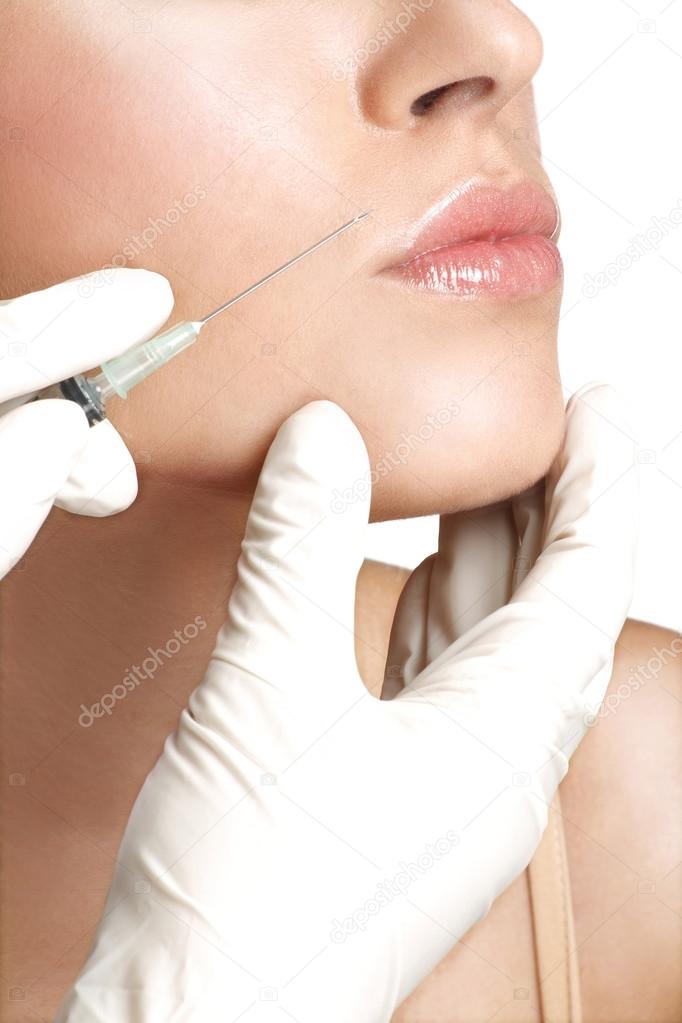 Beauty woman close up injecting cosmetic treatment
